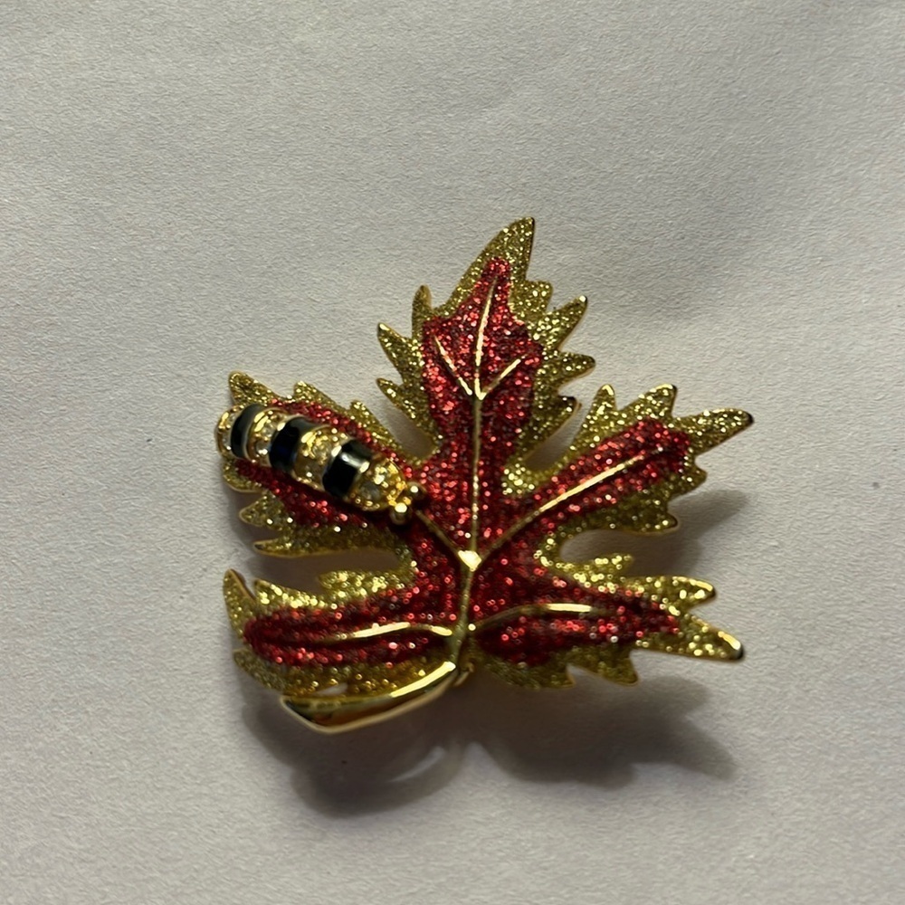 Caterpillar crawling on an autumn Maple leaf brooch. Gold tone.